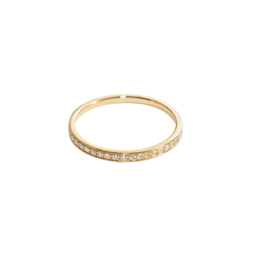 Gold ring with small diamonds on a white background