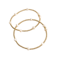 Three gold beaded bracelets on a white background