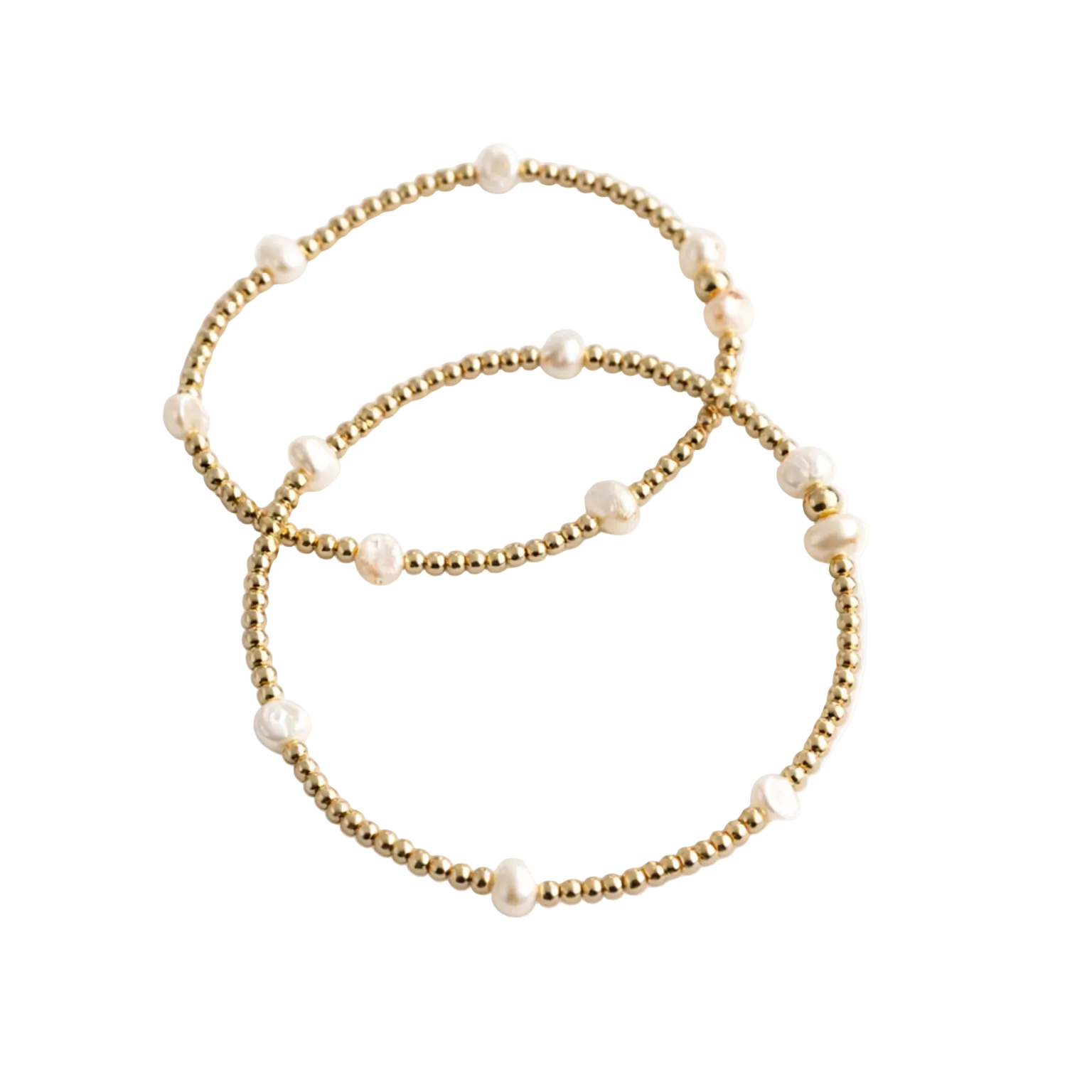 Three gold beaded bracelets on a white background